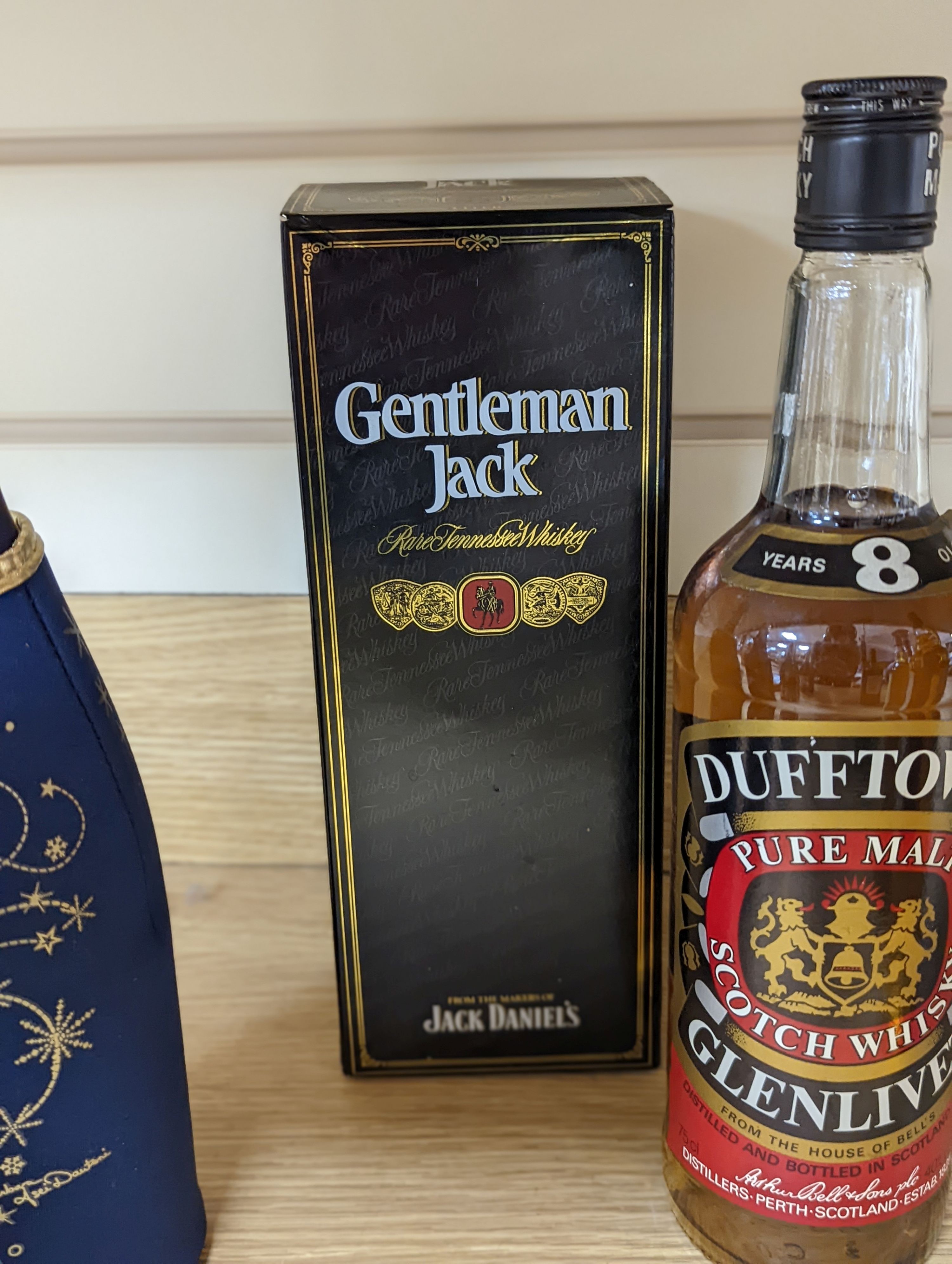 A collection of various whiskies and champagnes (12 bottles)